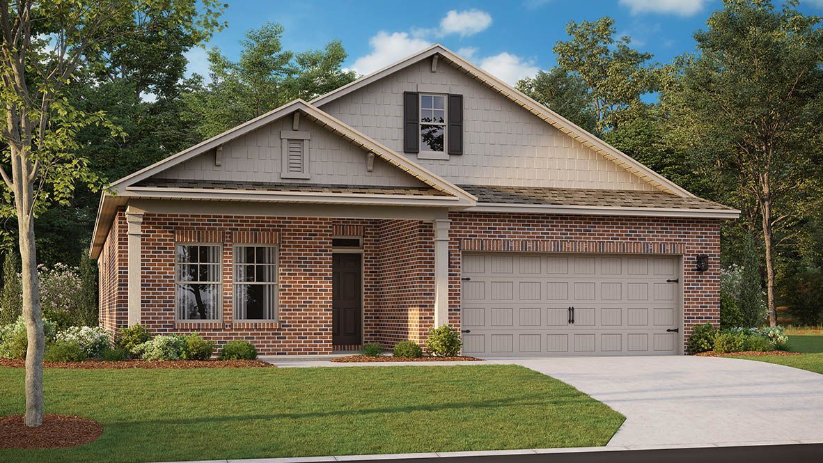 Brick house with beige garage door, small window above, and lush green lawn.