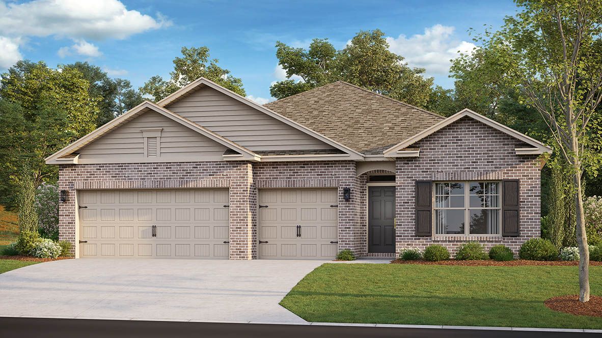 Brick and tan home with a two-car garage, a window with shutters, and a green lawn under a blue sky.