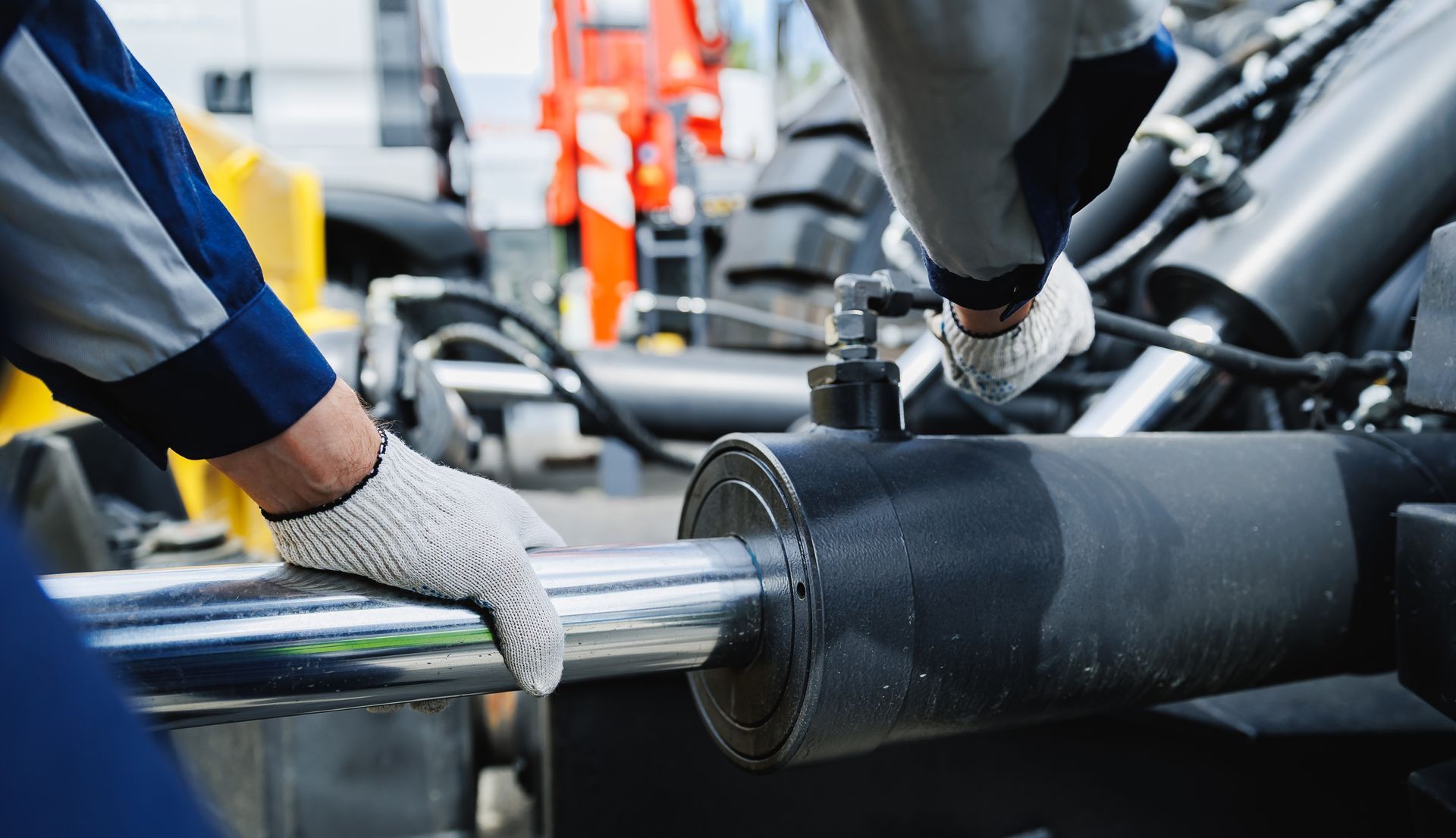 Worker mechanic check pipe system of hydraulic hose valves in industry machinery.