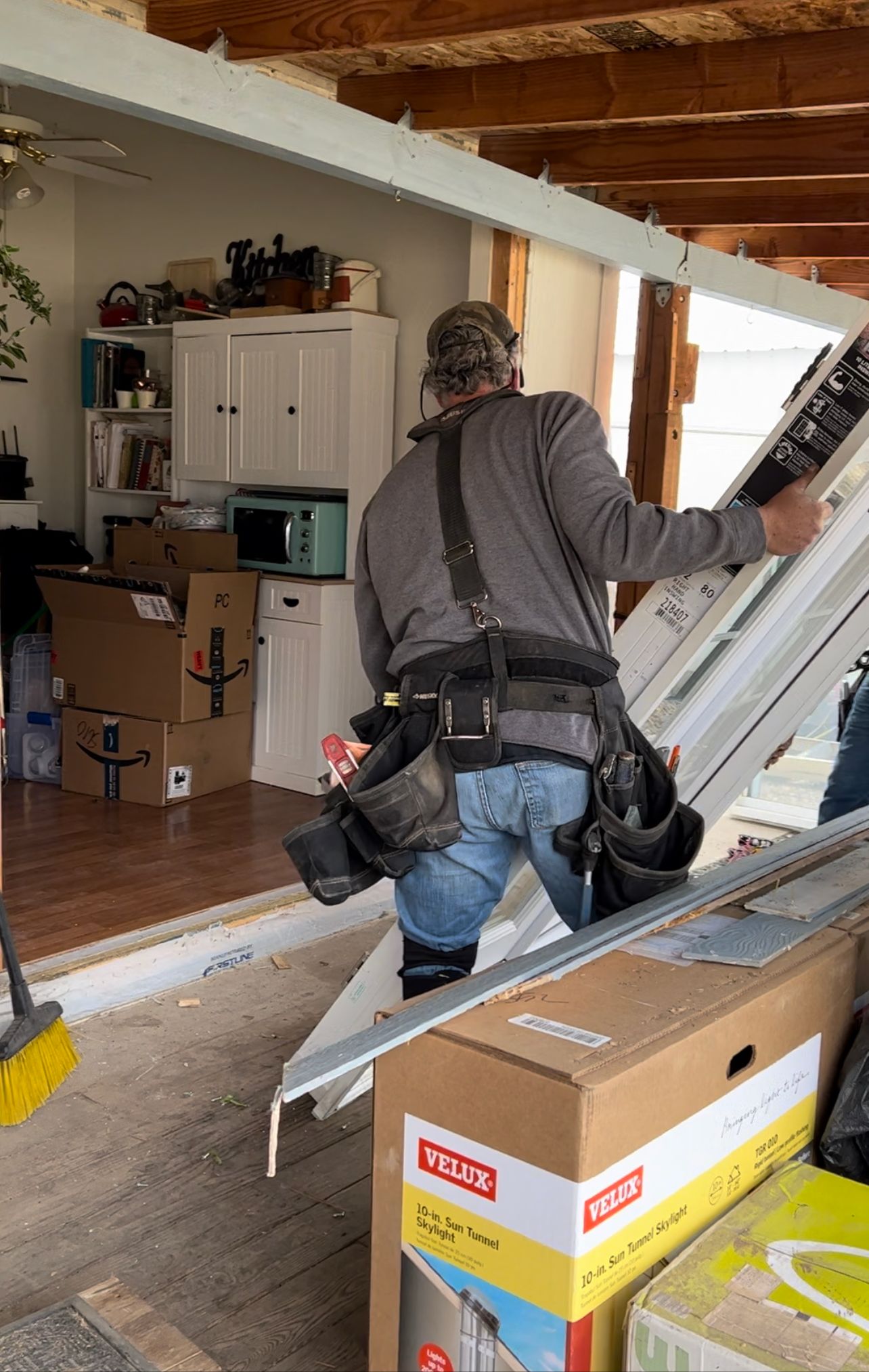 crew installing new French doors
