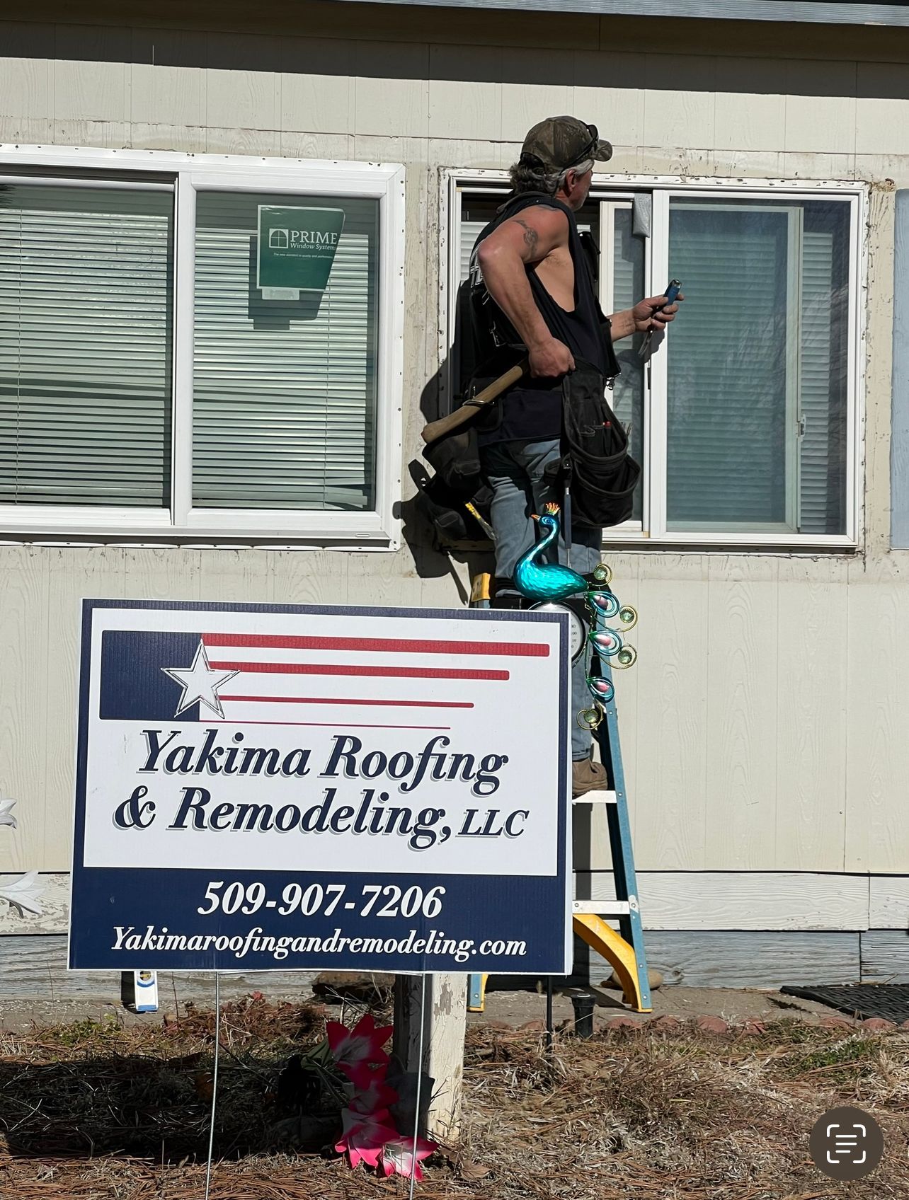 Old windows being removed by Yakima roofing and remodeling. 