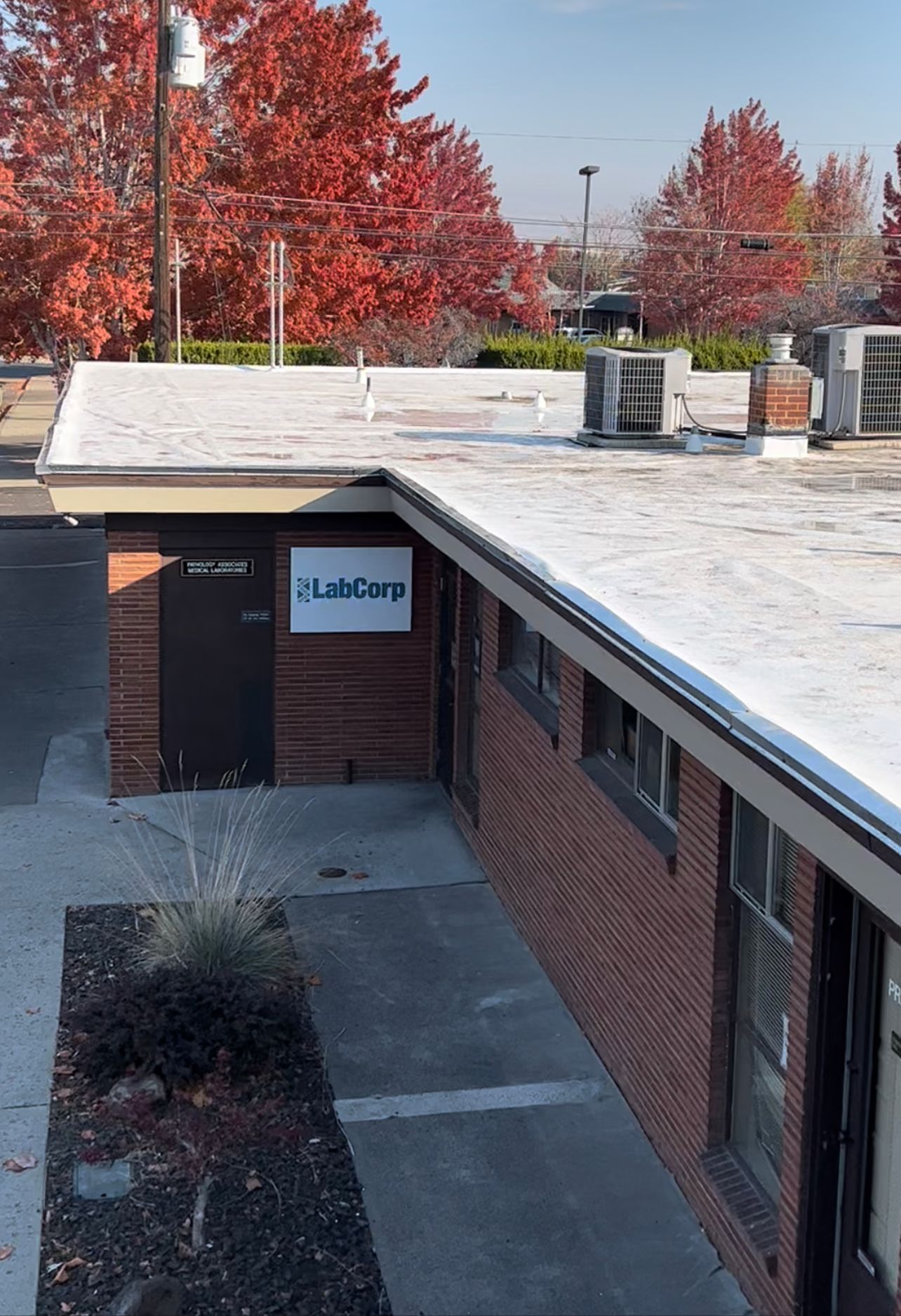 Completed TPO re-roof at LabCorp building in Yakima, WA, installed by Yakima Roofing & Remodeling.