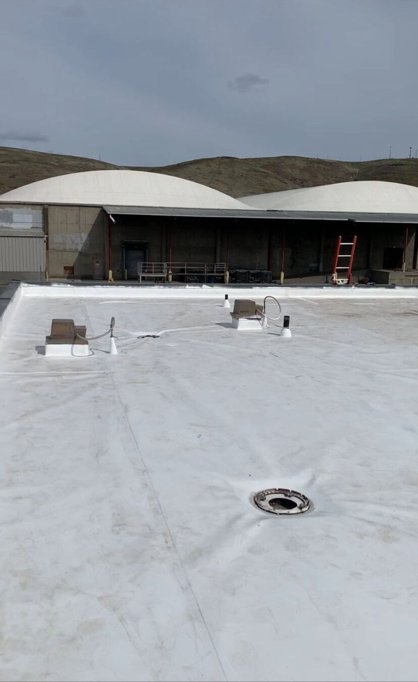 Fully completed TPO roofing system at Syntec US.