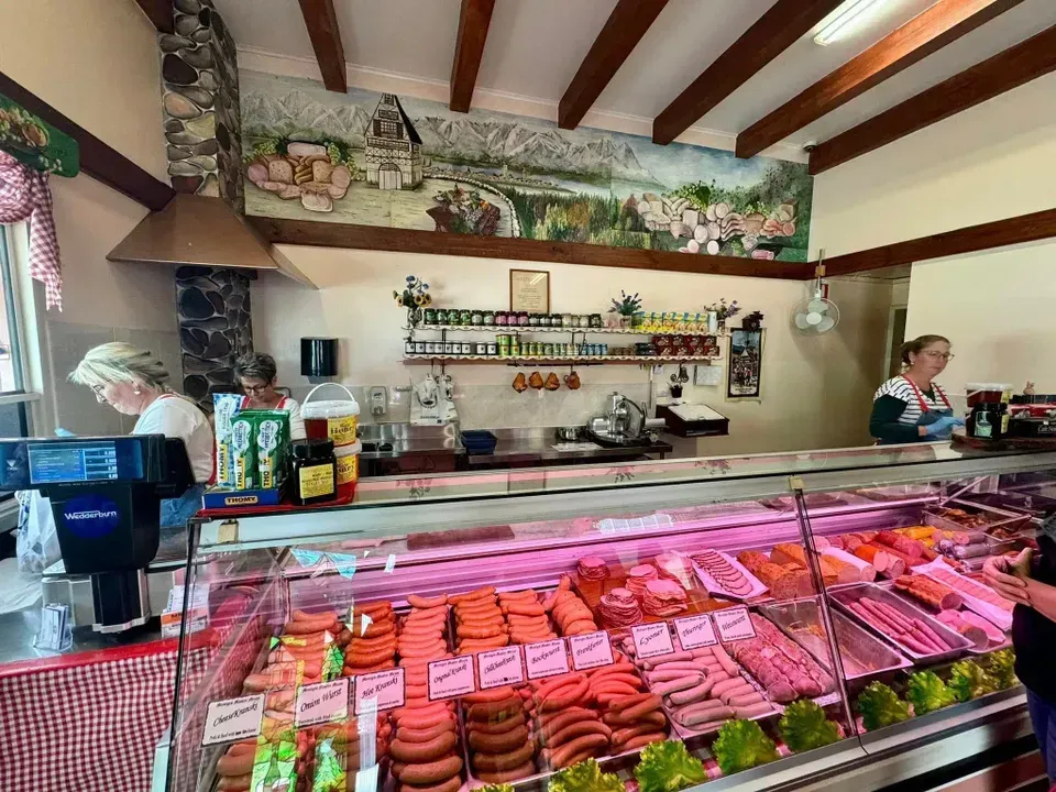 A Variety of Meats and Vegetables on A White Background — Mentges Master Meats Traditional Continental Smallgoods In Taree, NSW