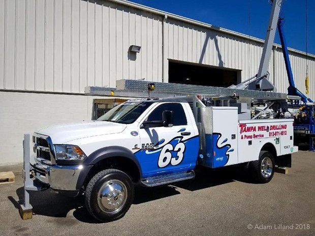 Truck With Stairs Above — Tampa, FL — Tampa Well Drilling