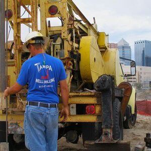 Man Checking The Well — Tampa, FL — Tampa Well Drilling