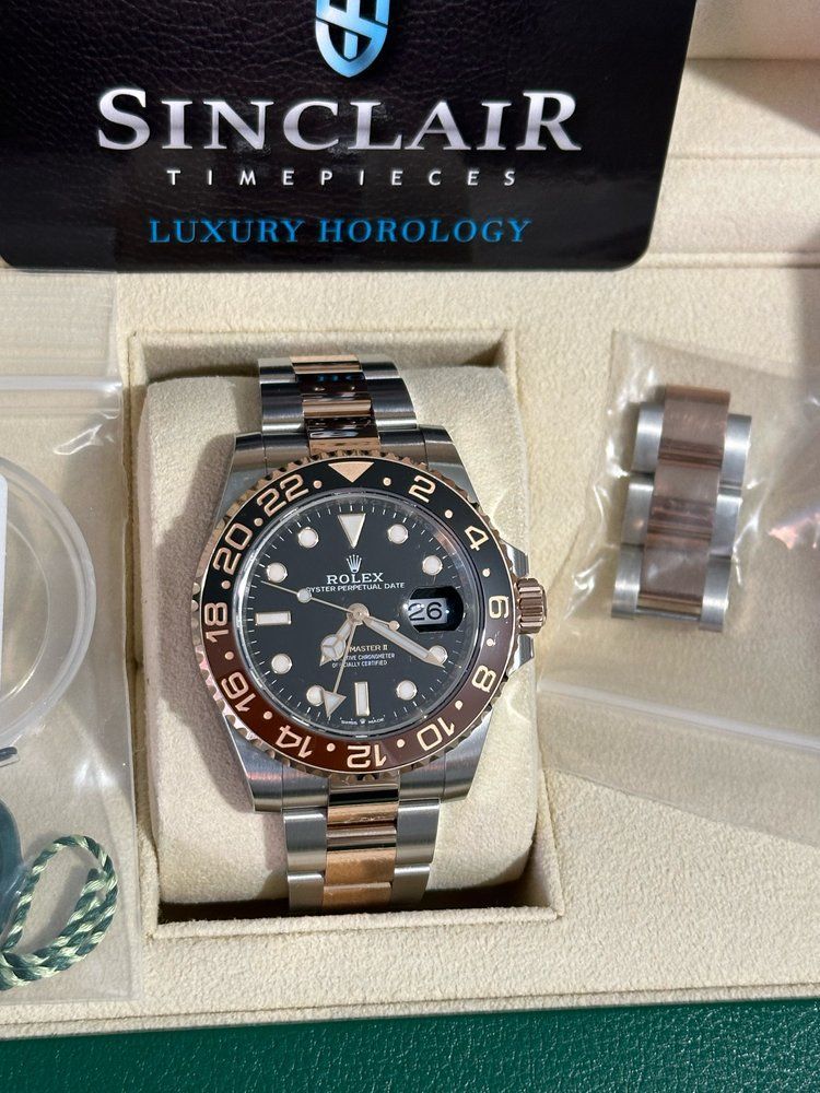 A sinclair timepieces luxury horology watch in a box