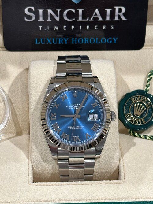 A sinclair timepieces luxury horology watch in a box