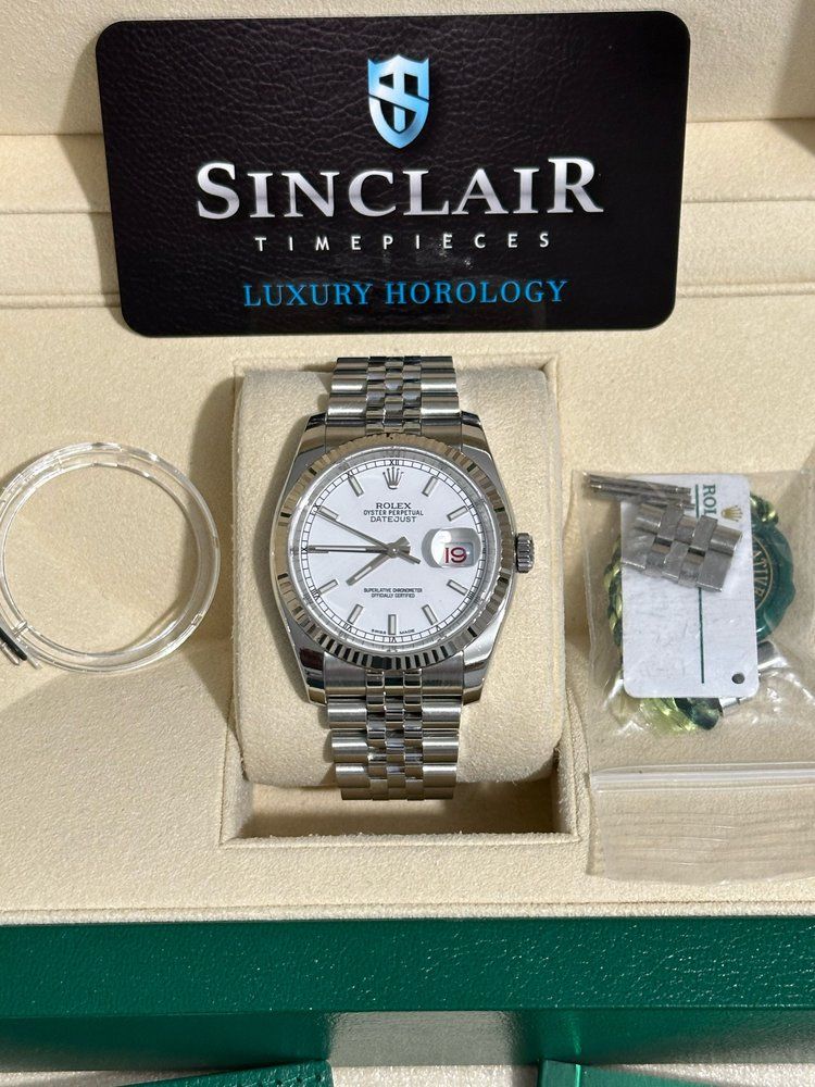 A sinclair timepieces watch is in a box