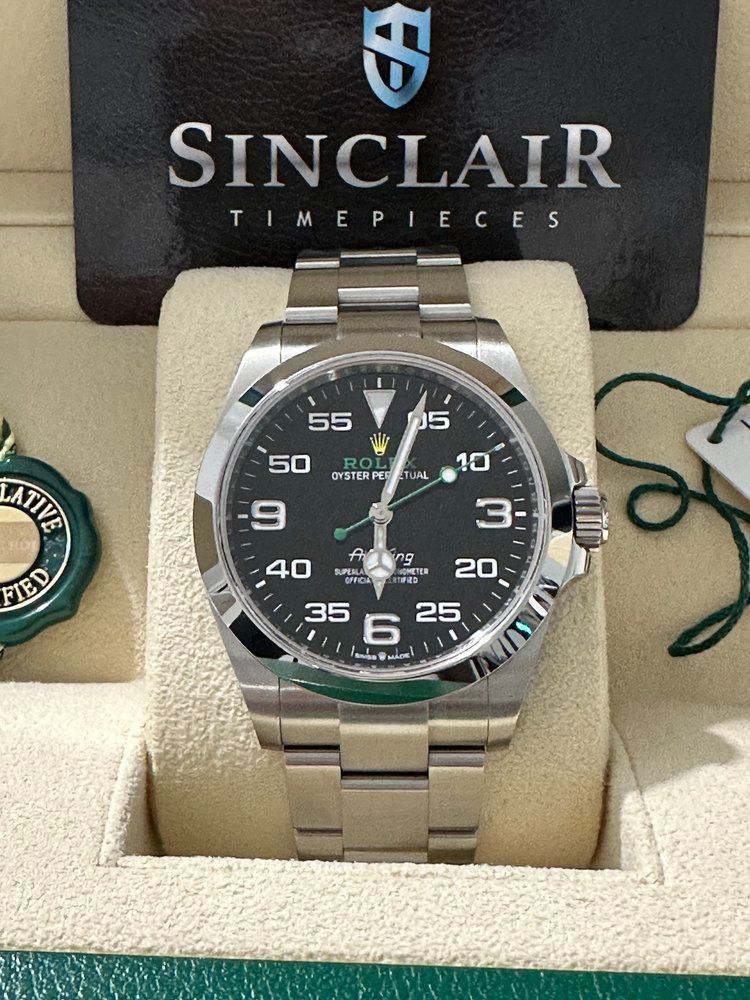 A sinclair timepieces watch is on display in a box