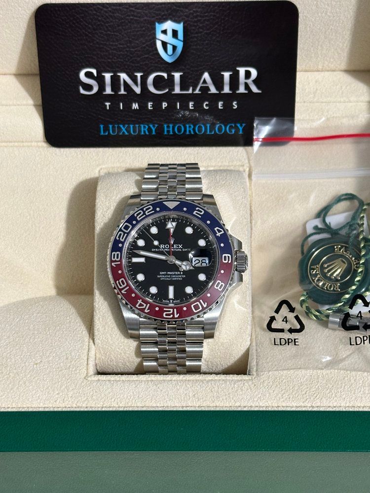 A sinclair timepieces luxury horology watch in a box