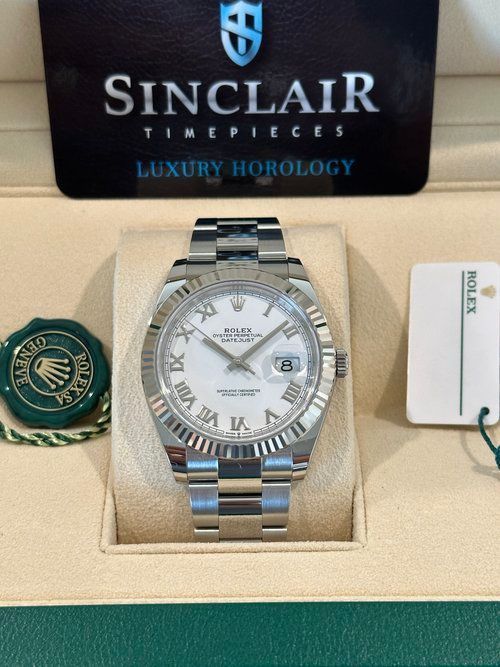 A sinclair timepieces luxury horology watch in a box