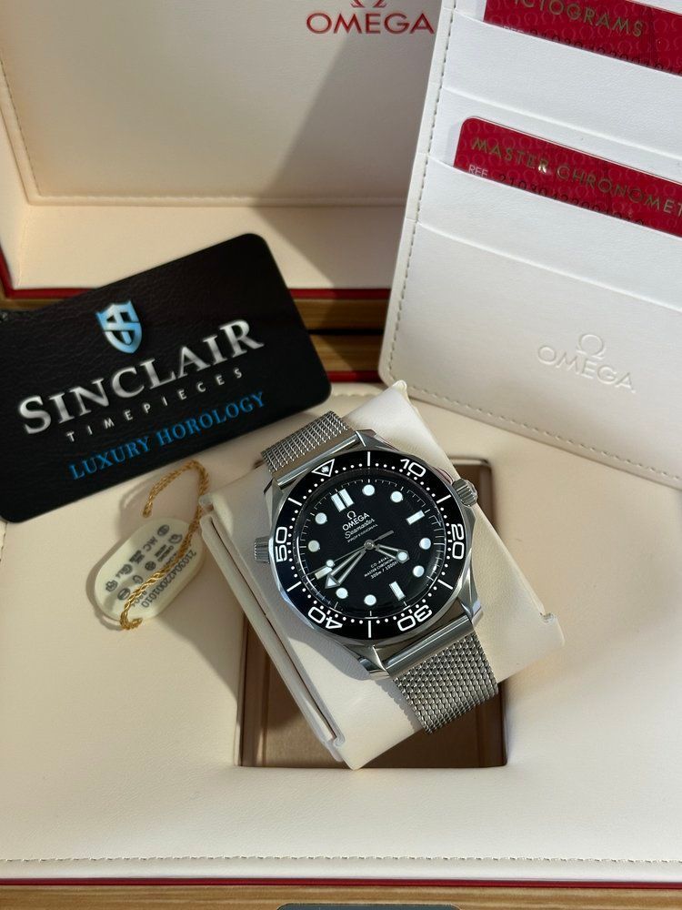A watch in a box with a card that says sinclair luxury horology