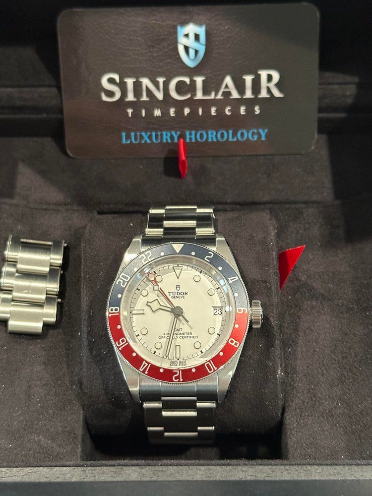 A sinclair timepieces luxury horology watch in a box
