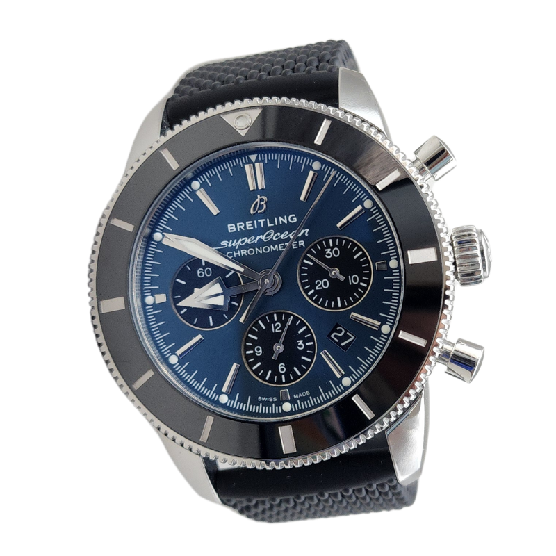 A breitling watch has a black band and a blue face