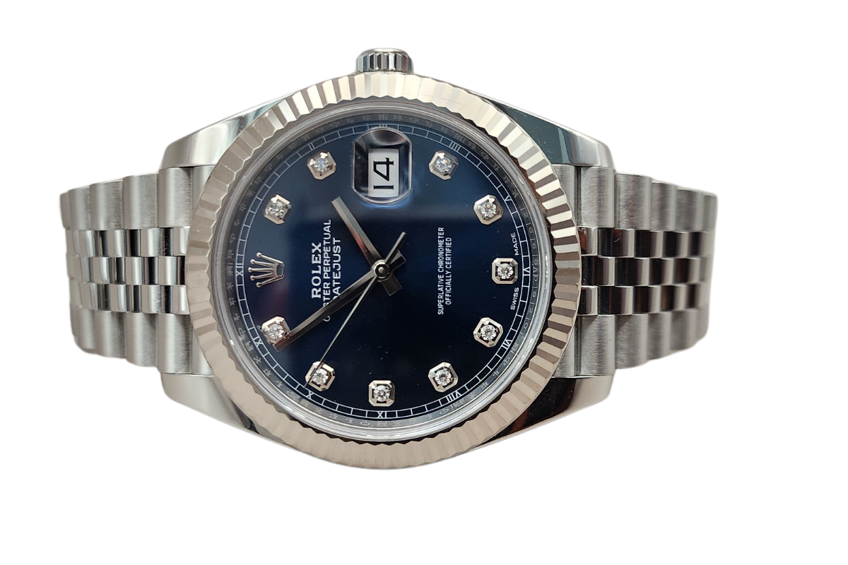 A silver rolex watch with a blue face and diamonds