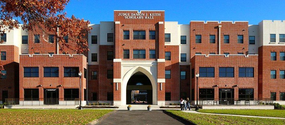A large brick building with the word university on it