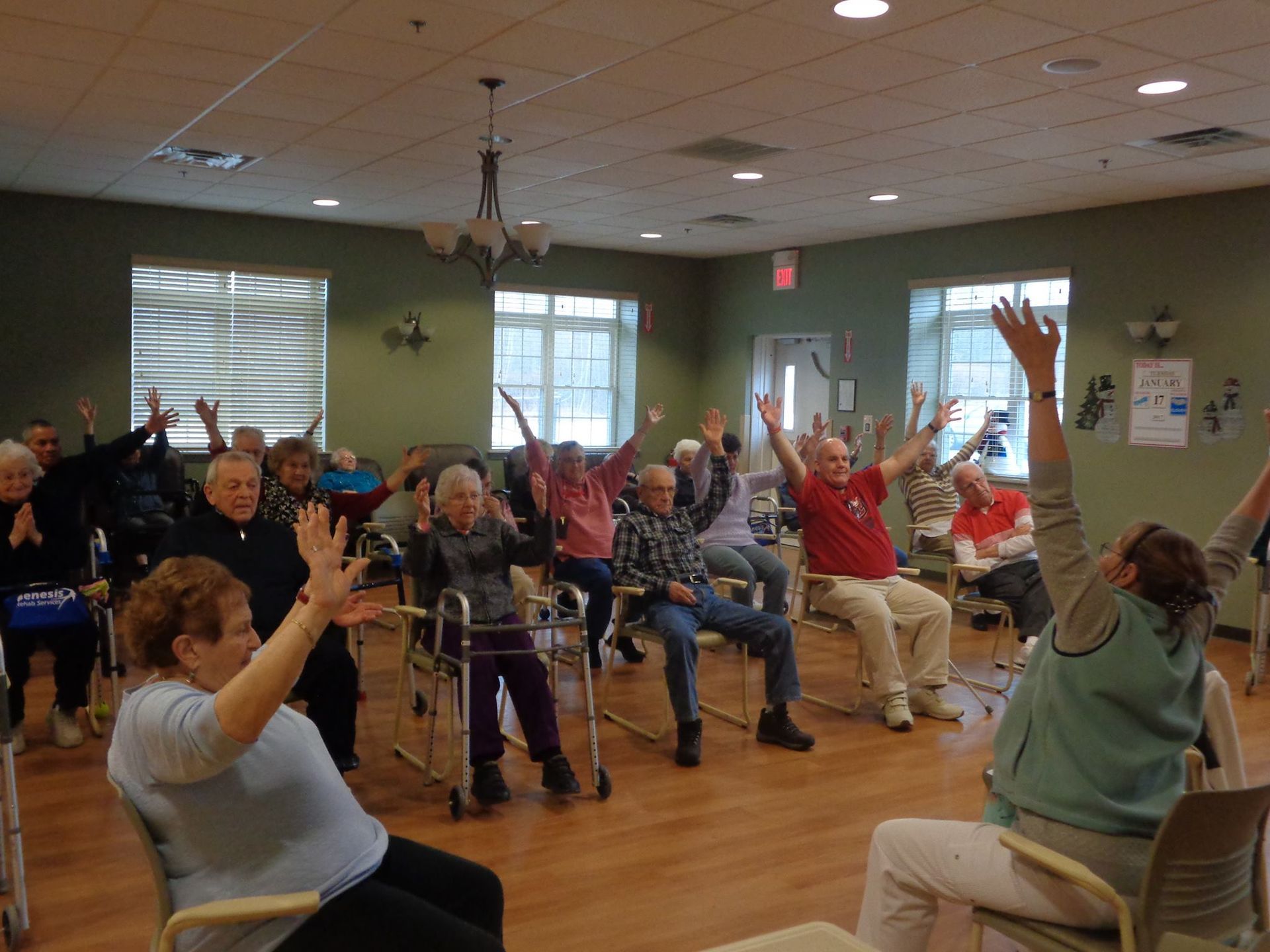 A man and a woman are jogging in a park.