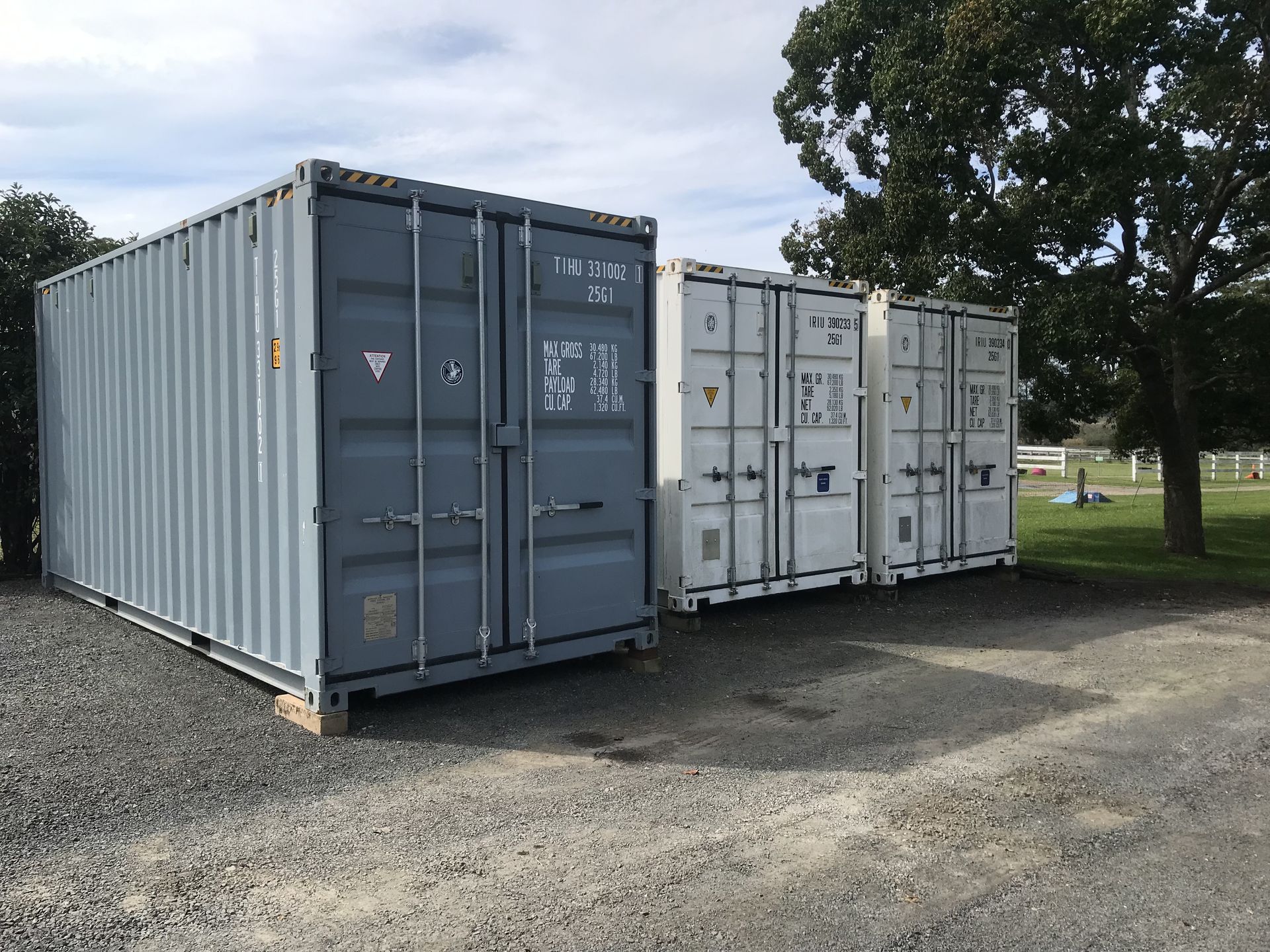 A cart filled with boxes in a storage room.