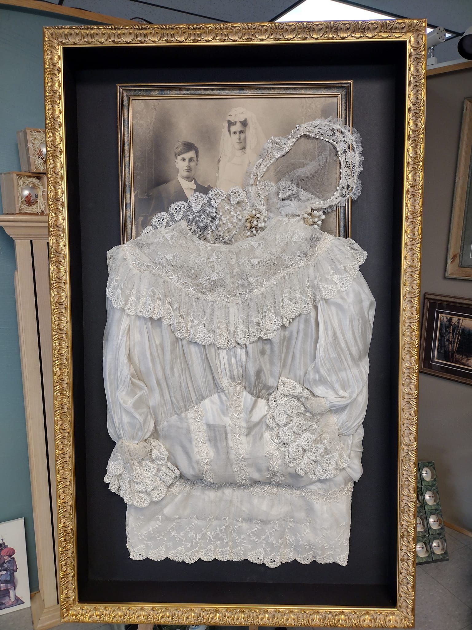 A framed picture of a woman in a wedding dress