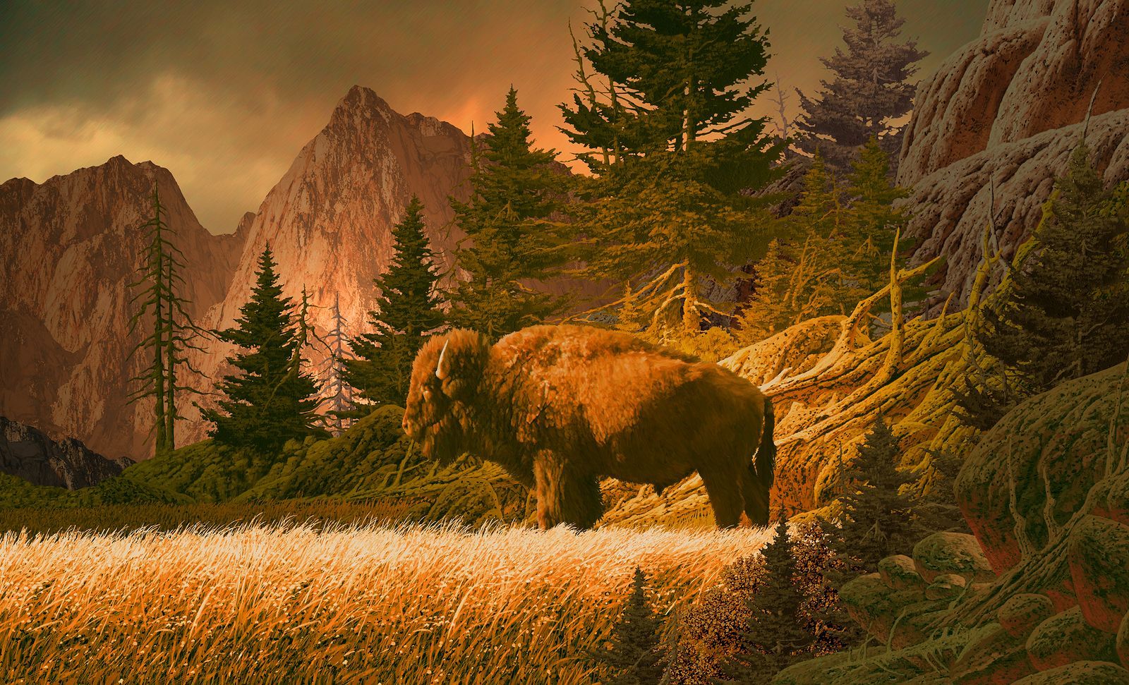 A bison is standing in a field with mountains in the background.