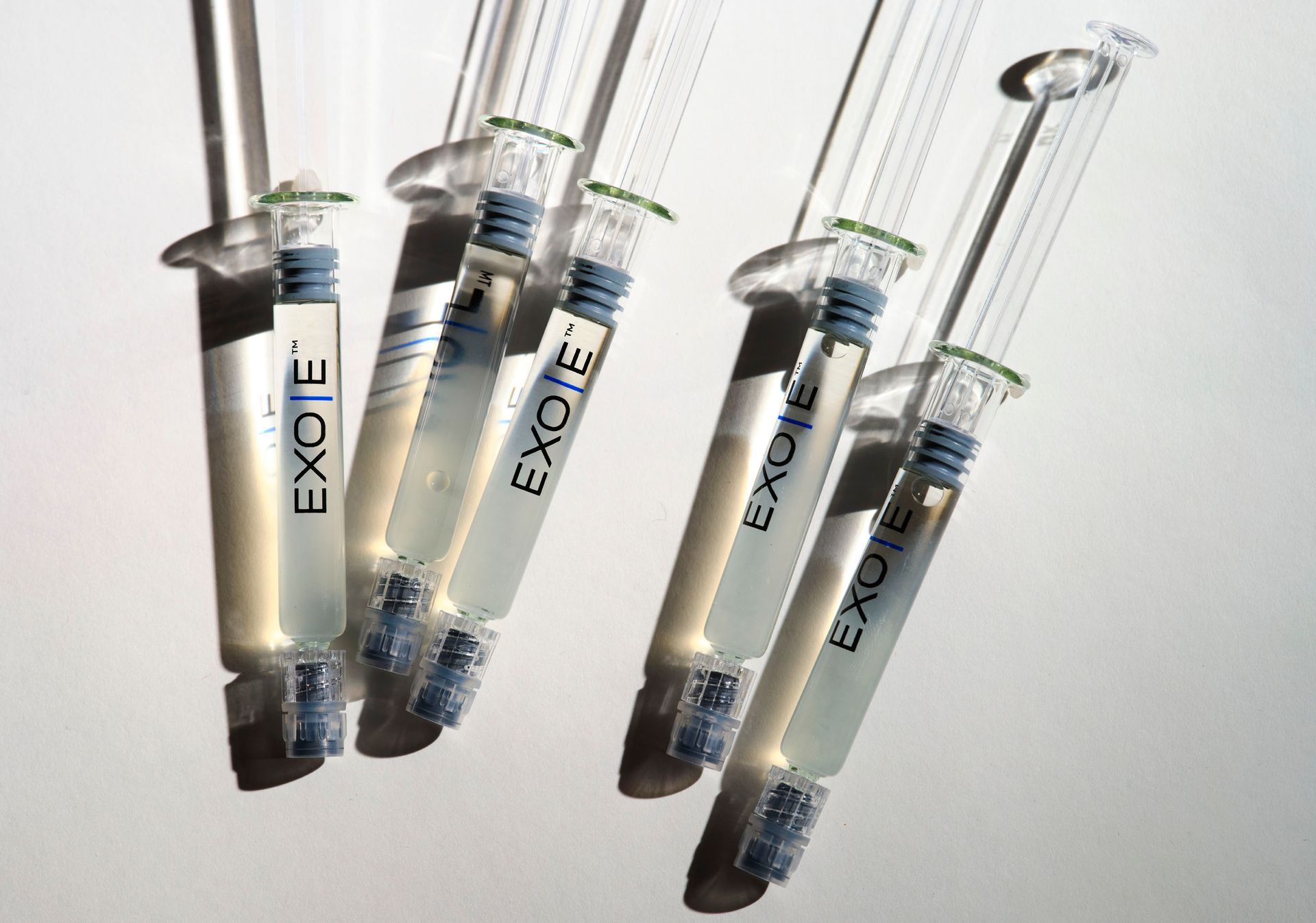 A group of syringes with EXO|E written on them