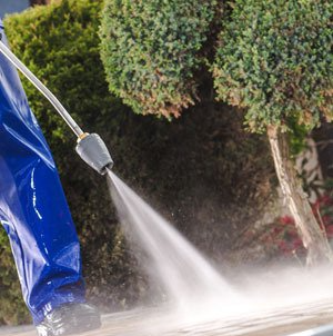 Men Washing Garden Paths