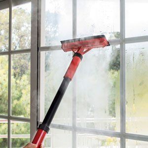 Cleaning window with steam in the Apex and Garner, NC area