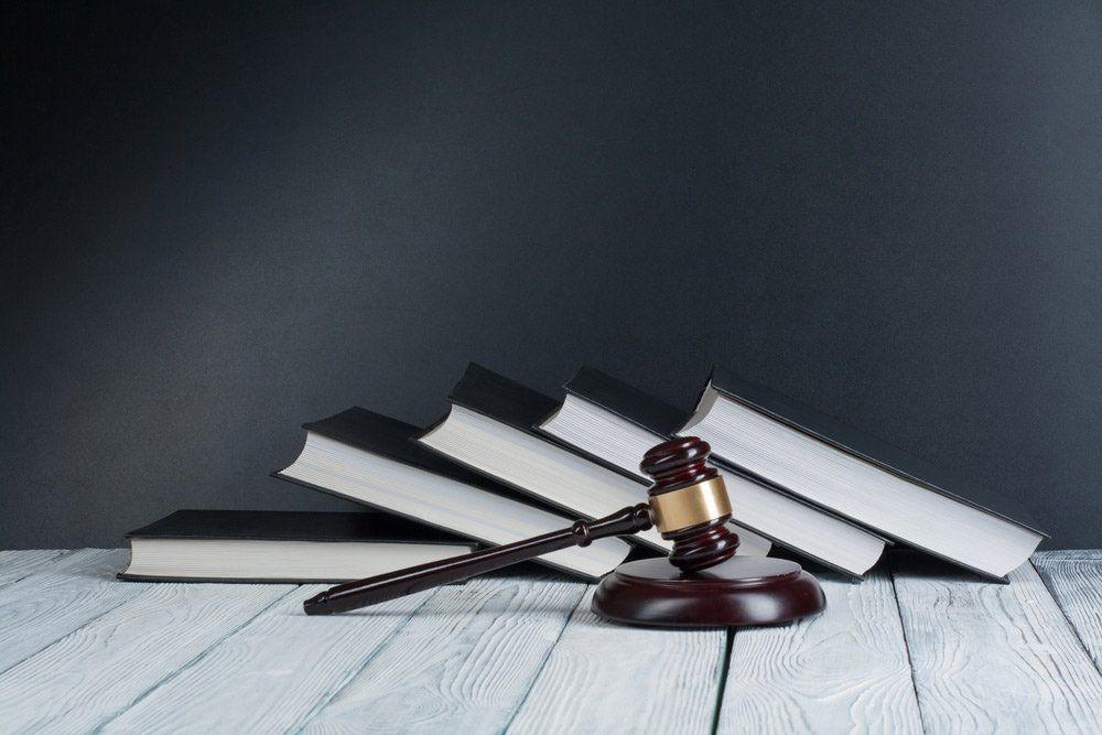 Law Books with Judge Gavel — Property Lawyers in Darwin, NT