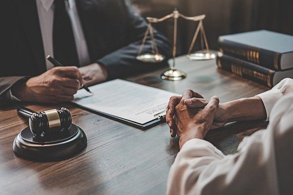 Lawyer having Meeting with the Client in the Office — Legal Advice and Representation in Darwin, NT