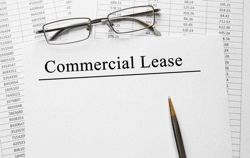 Paper with Commercial Lease on the Table — Property Lawyers in Darwin, NT