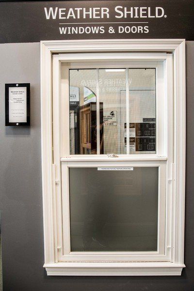 Commercial Windows — A Window with a White Frame in Farmingdale, NY