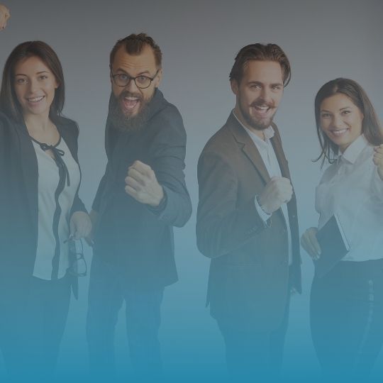 A group of people are standing next to each other and smiling.