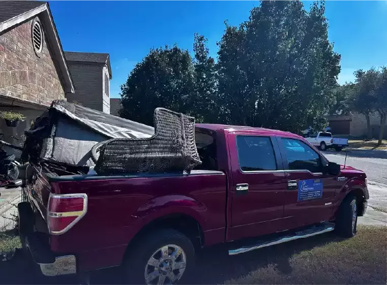 Junk in the Jacked Hauling truck