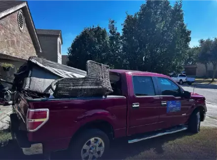 Junk in the Jacked Hauling truck