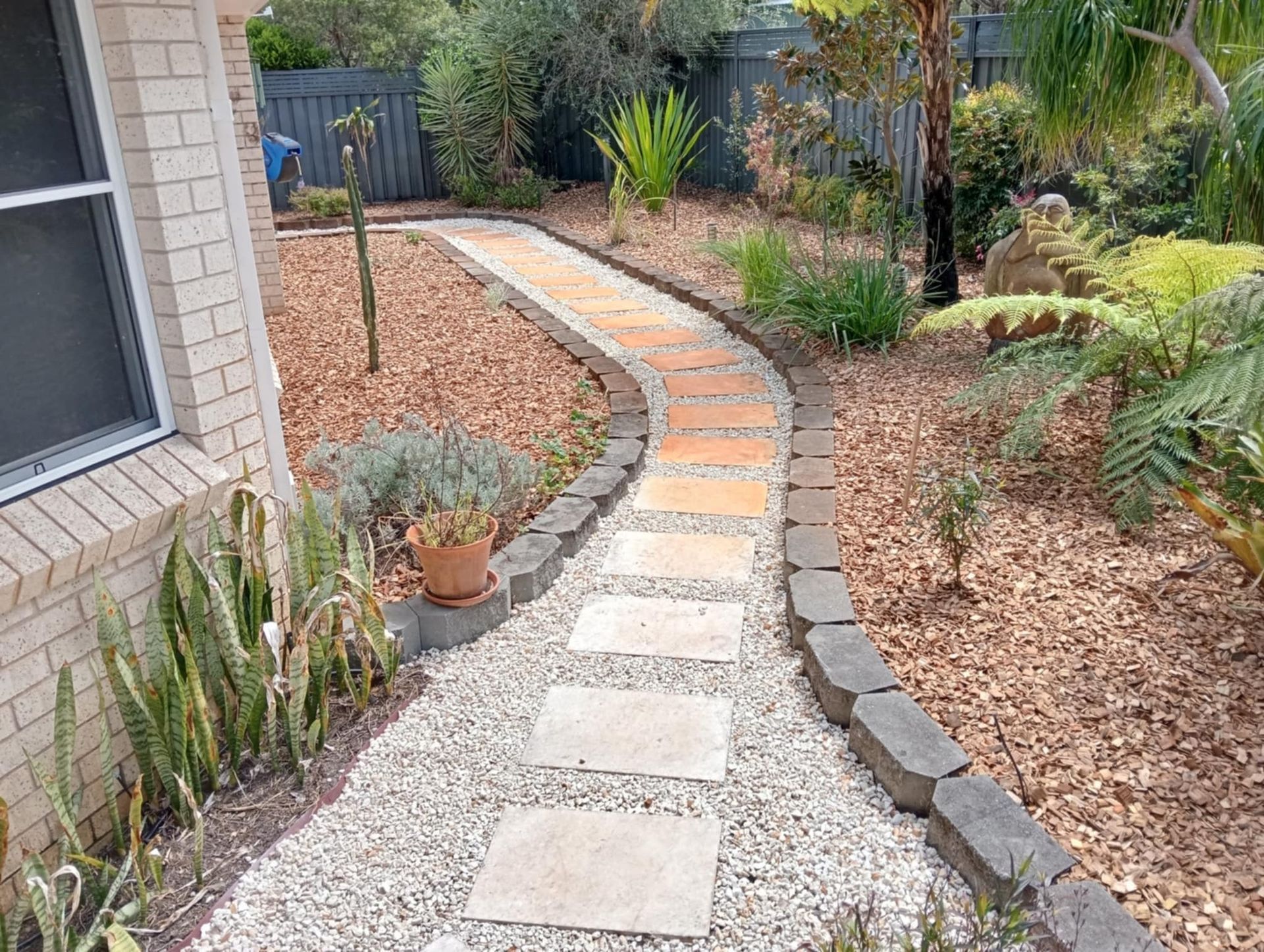 A Car Is Parked Next To A Trailer That Says Amaze On It — Amaze Lawn and Garden Care In Nelson Bay, NSW