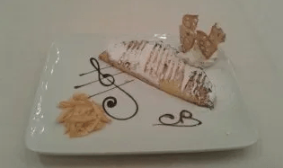 Crespella tiepida con crema di limone e arancio caramellato dei nostri agrumi biologici