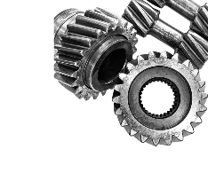 Three gears are stacked on top of each other on a white background. | Patterson Brothers Automotive