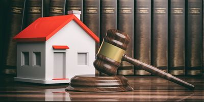 Real Estate Attorney — Small House and Books in Jacksonville Beach, FL