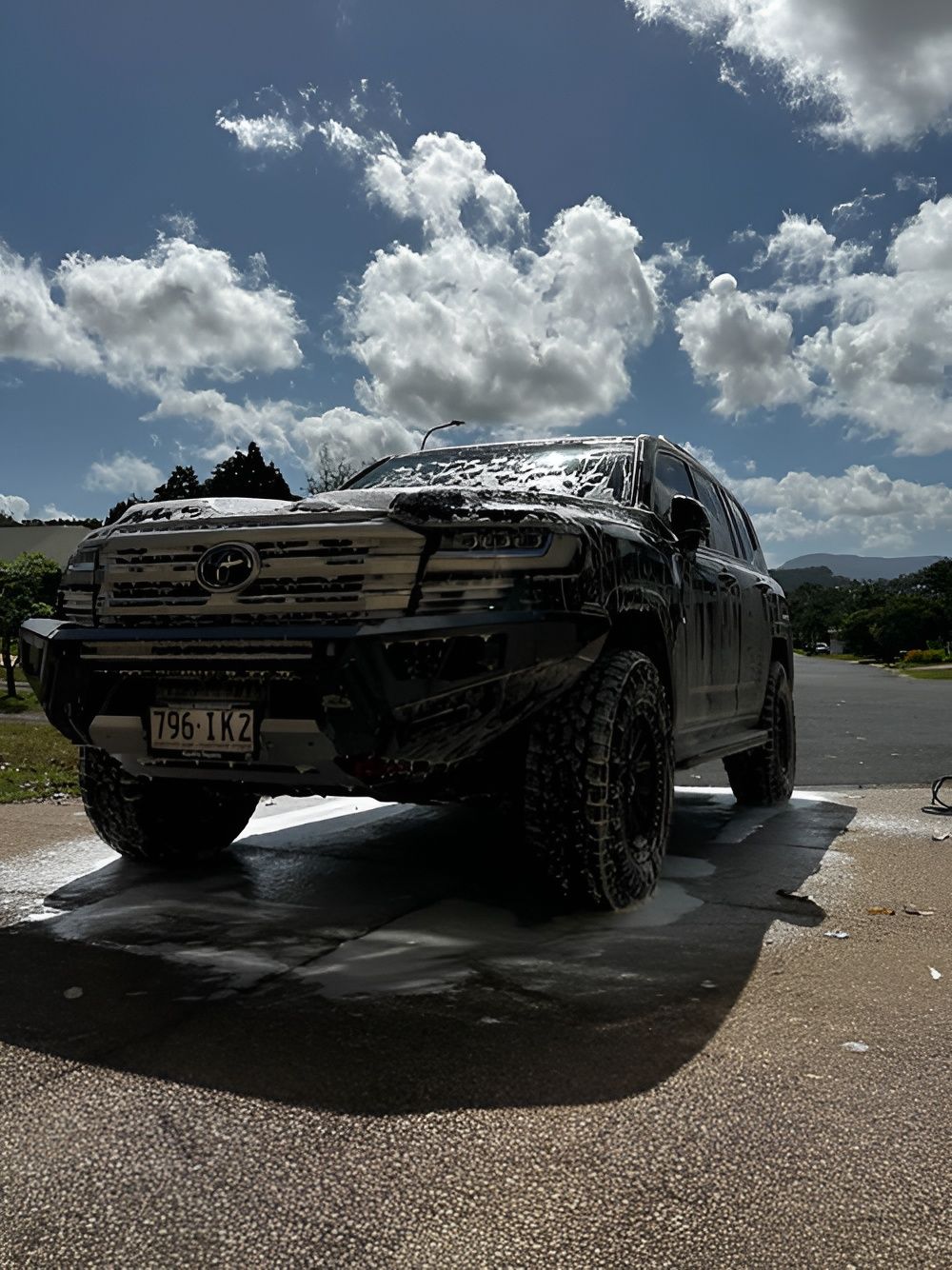 Black Suv Covered in Soap Suds, Being Washed — Mobile Club Car Cleaning in Earlville, QLD