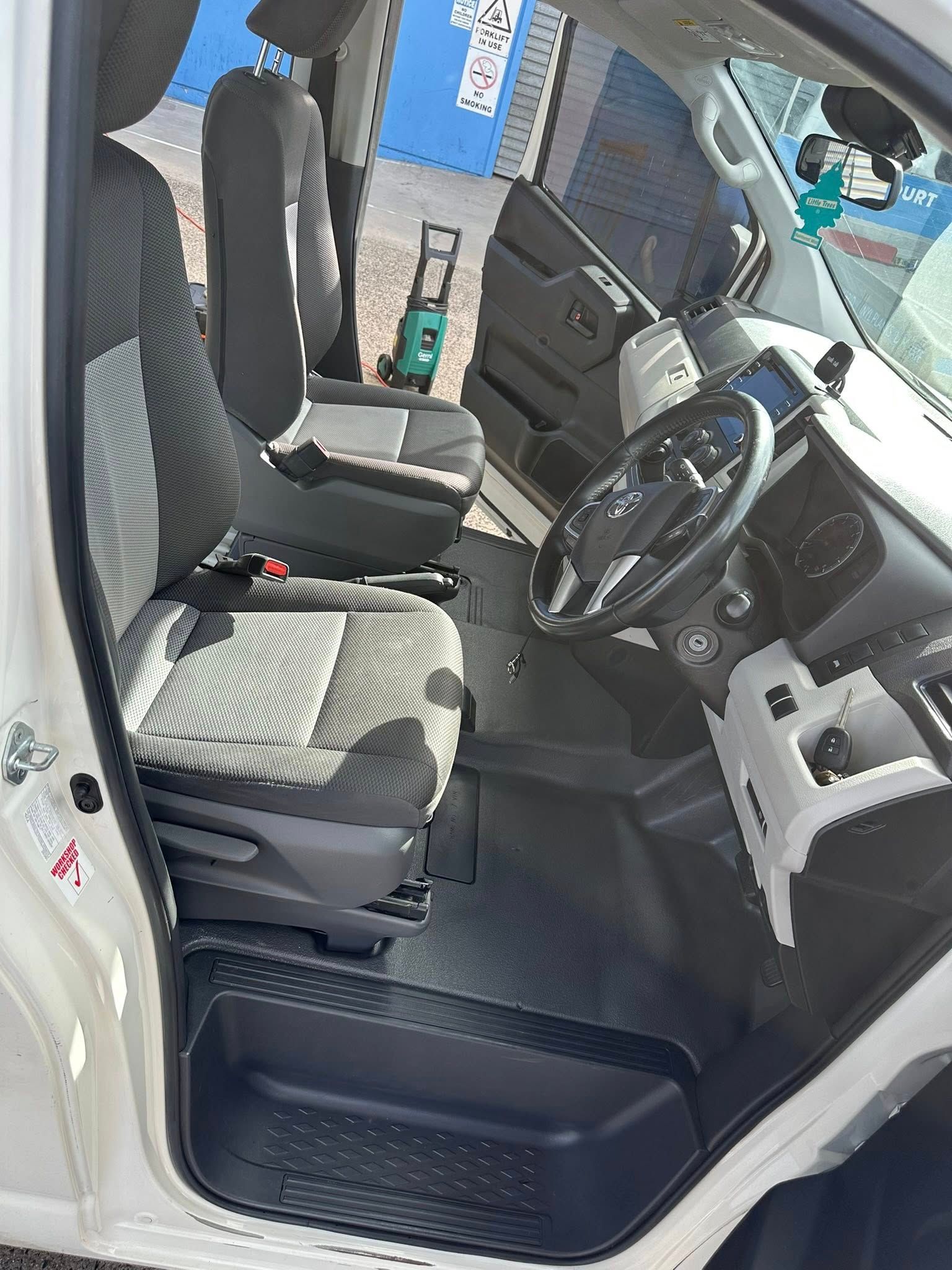 Interior of a White Van With Black Flooring — Mobile Club Car Cleaning in Earlville, QLD