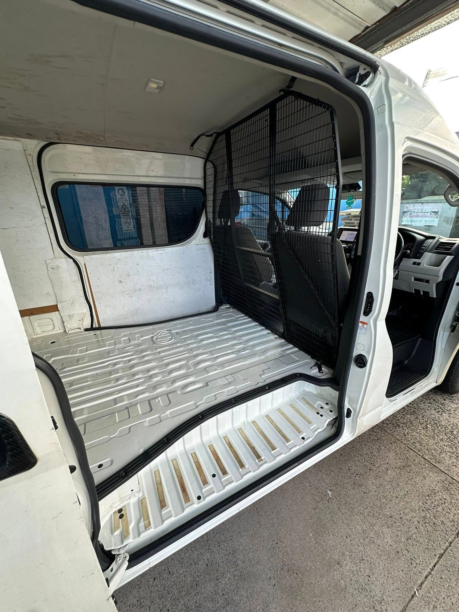 Open Back of a White Cargo Van; Interior With White Walls — Mobile Club Cars Cairns in Innisfail, QLD