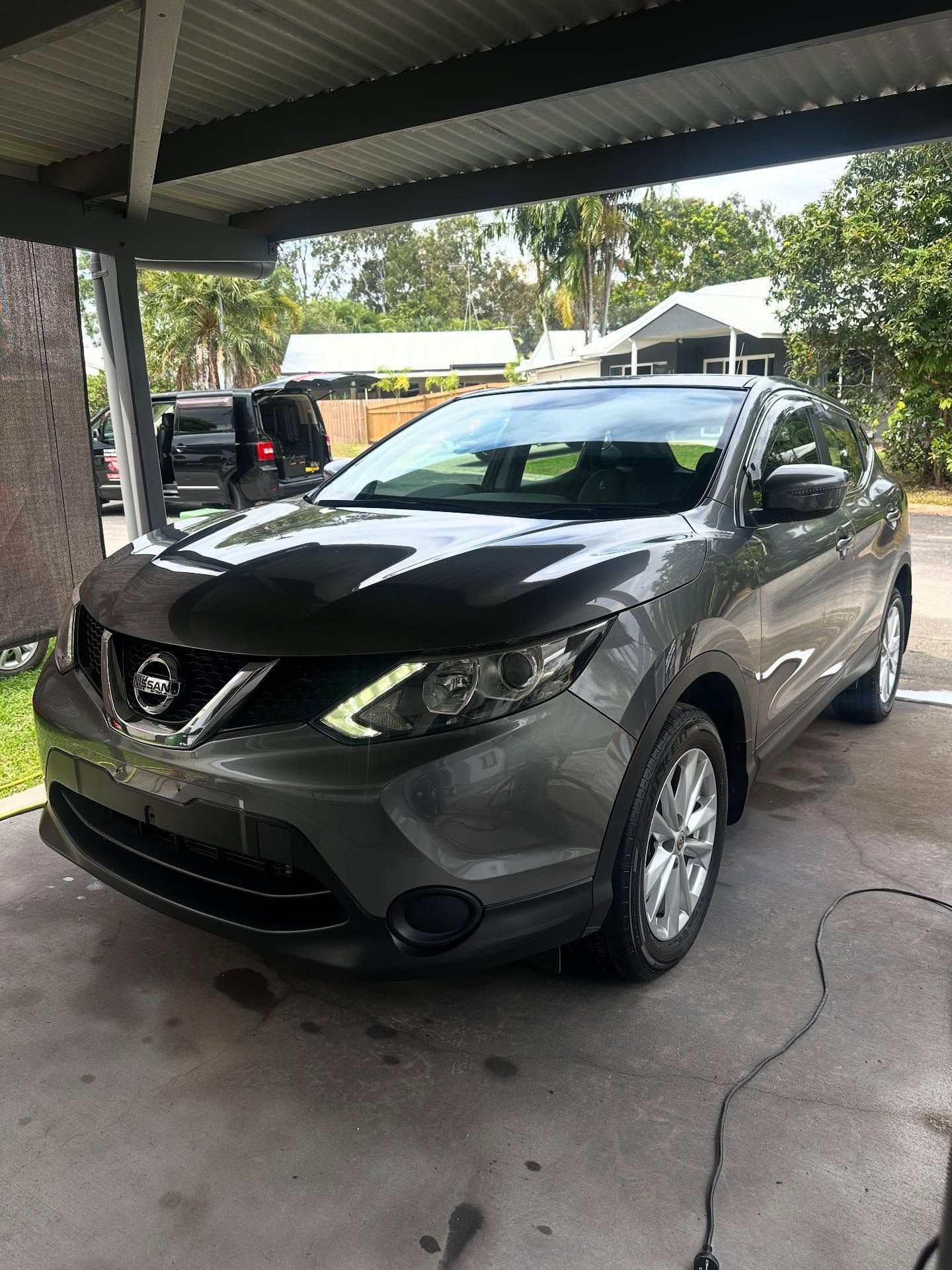 A Gray Nissan Qashqai Suv Parked Under a Metal Carport — Mobile Club Cars Cairns in Tully, QLD