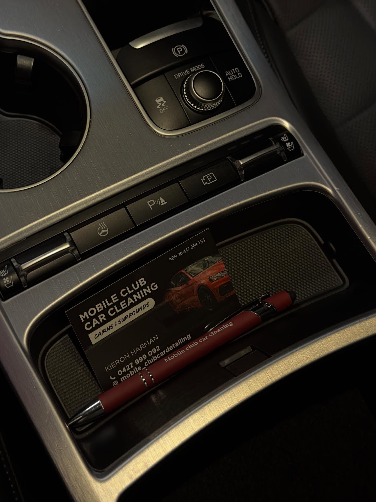 A Business Card for Mobile Club Car Cleaning and a Burgundy Pen — Mobile Club Cars Cairns in Mission Beach, QLD