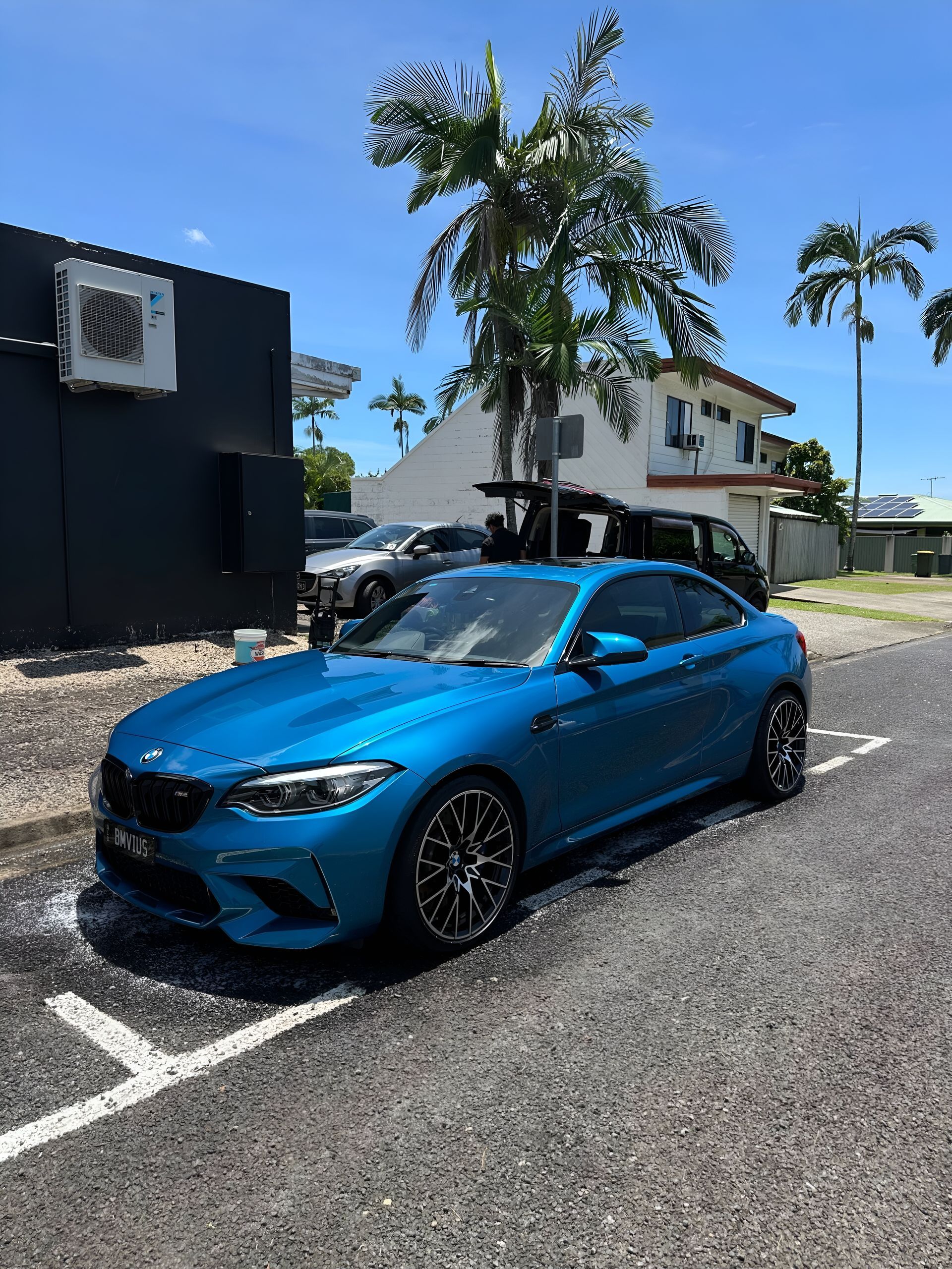 Blue Bmw Coupe Parked in a Lot — Mobile Club Car Cleaning in Earlville, QLD