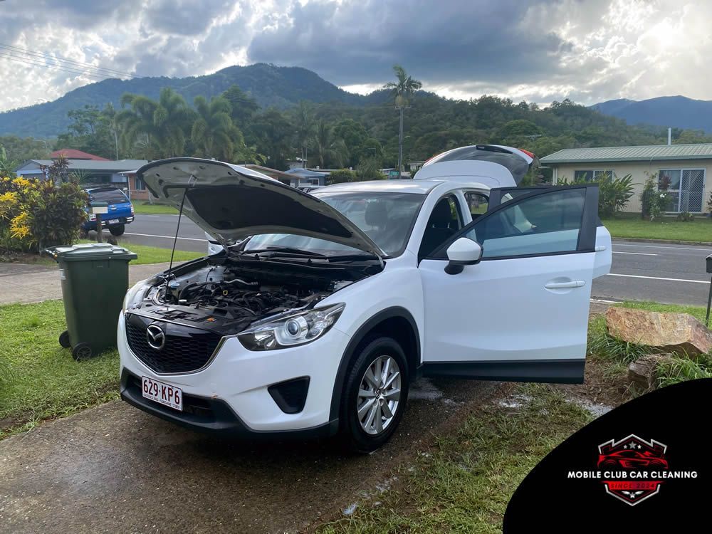 White Mazda Suv With Open Hood and Doors — Mobile Club Car Cleaning in Earlville, QLD