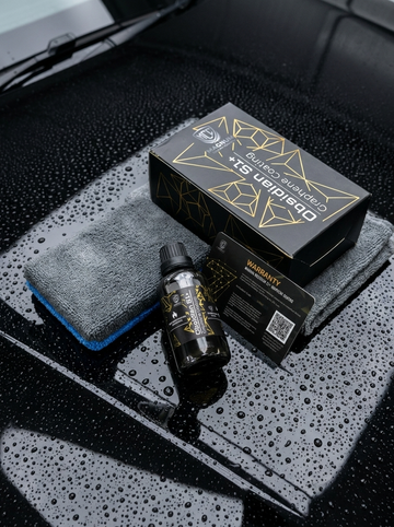 Black-and-gold Cosmetic Box, Bottle, and Towel on a Wet Car Seat — Mobile Club Cars Cairns in Earlville, QLD