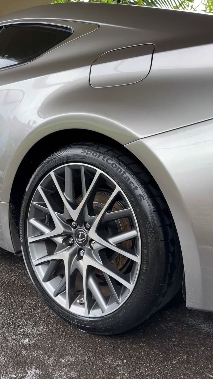 Silver Car Rear Quarter Panel With Alloy Wheel — Mobile Club Car Cleaning in Earlville, QLD