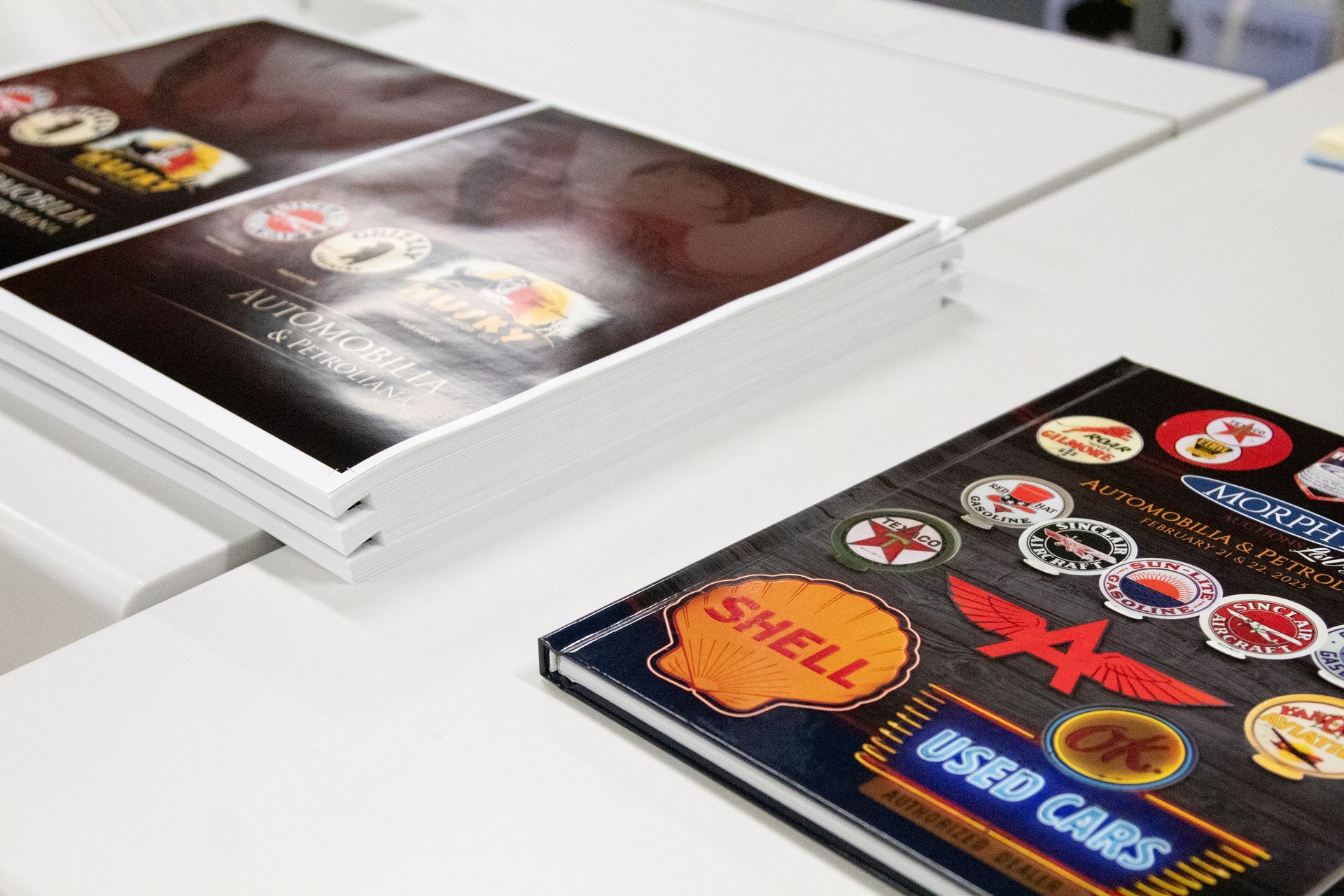 A stack of books sitting on top of each other on a table.