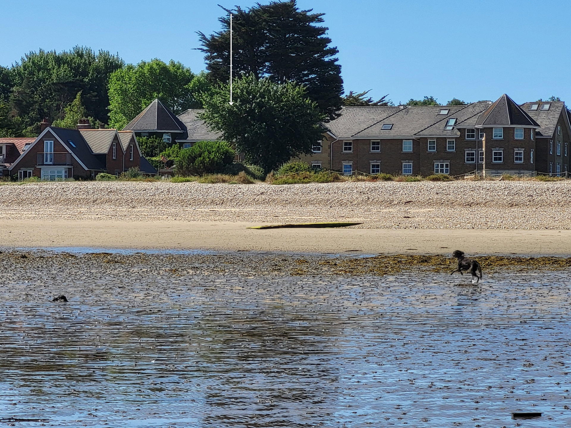 HB Holiday Lettings. A large body of water with houses in the background